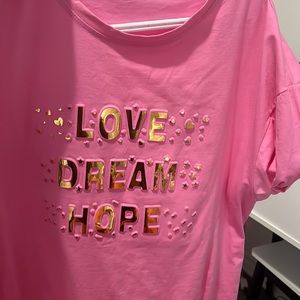 It’s a light pink cute shirt